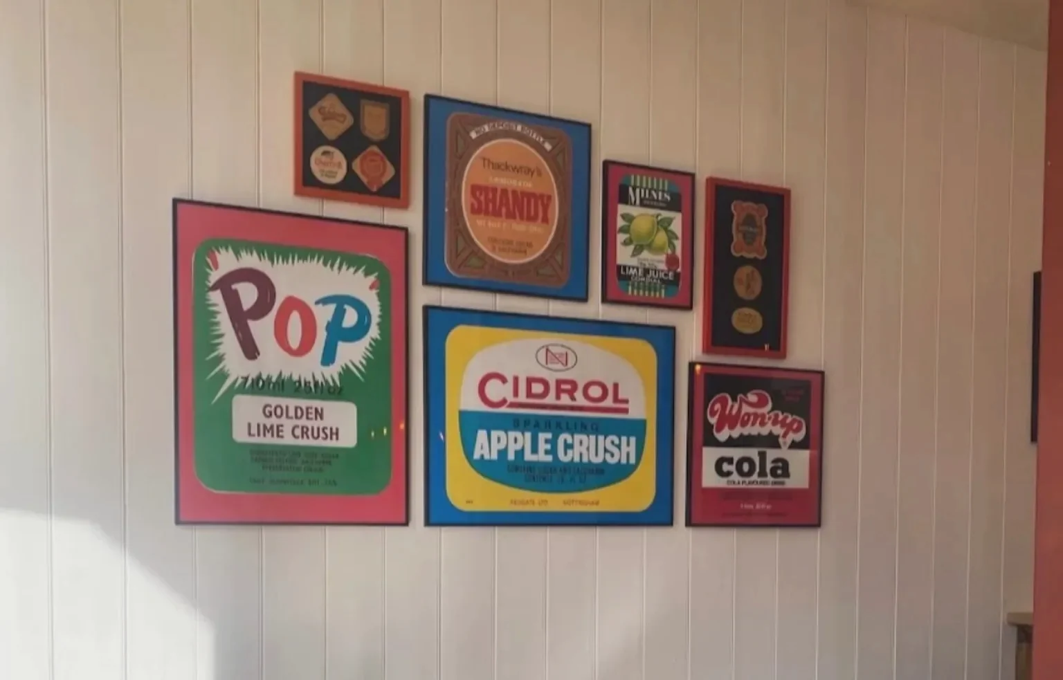 Vintage soft-drink artwork inside Newhaven Tap