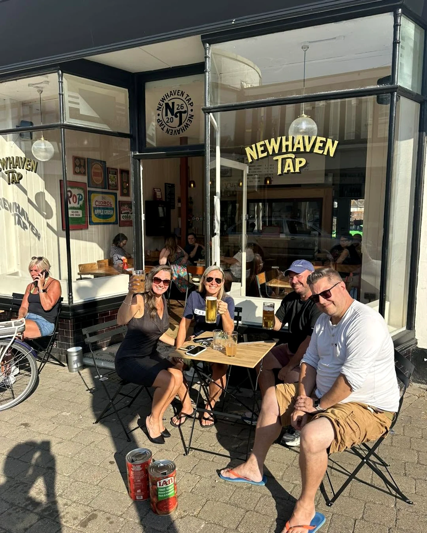 Customers enjoying drinks outside Newhaven Tap